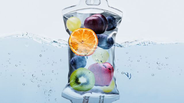 Fruit Slices In Saline Bag Dipped In Water Against Background